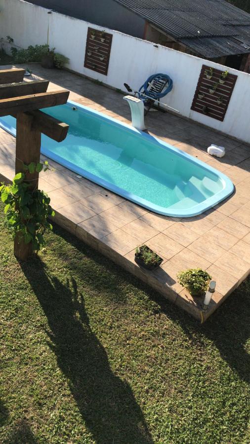 Apartamento inteiro com piscina em Balneário Pinhal - B&B Balneário Pinhal