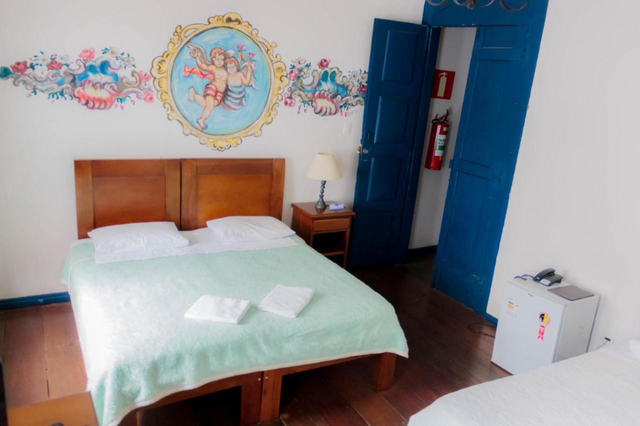 Suíte Deluxe com janela para o pátio
