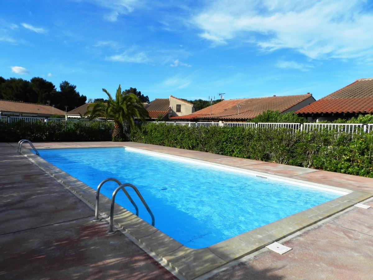 LES JARDINS D ETE Maison climatisée dans résidence avec piscine - 3 chambres - Parking - Wifi - Ferienwohnung