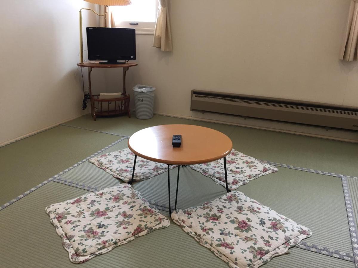 Dreibettzimmer mit Bergblick