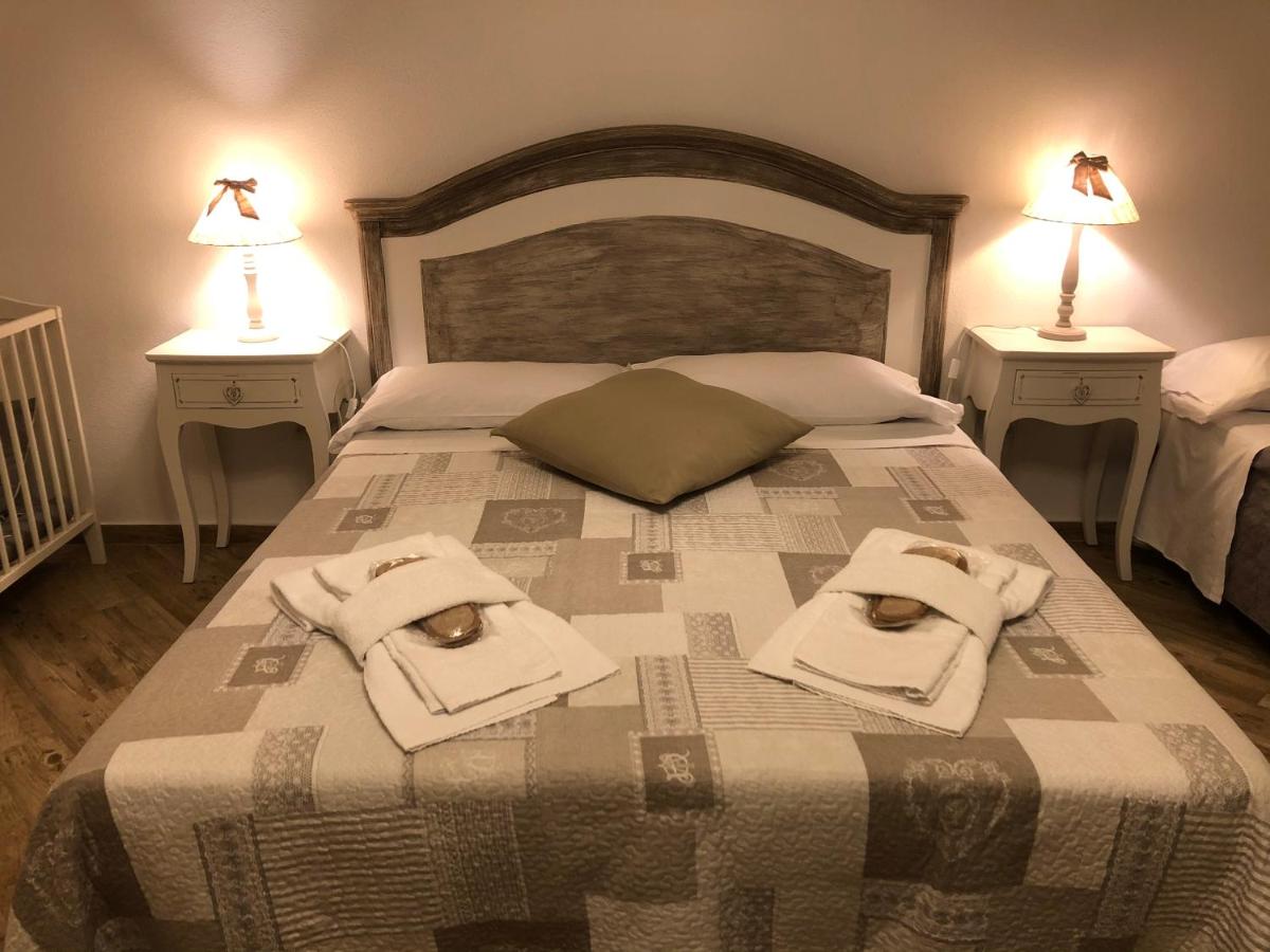 Camera Quadrupla Superior