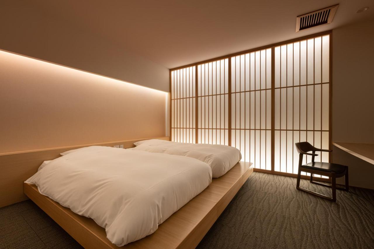 Chambre Triple avec Salle de Bains Privative