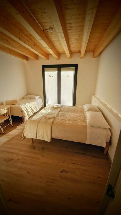 Habitación Triple con vistas al jardín