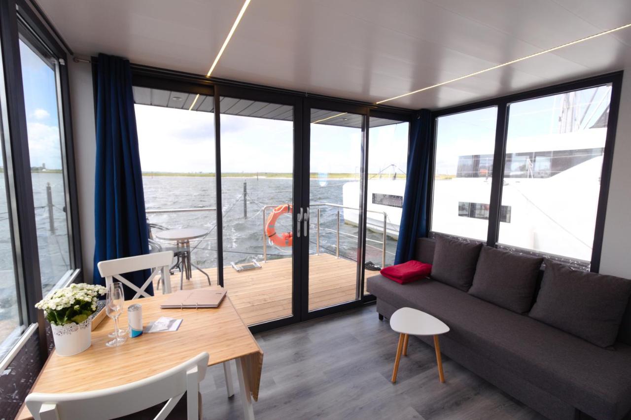 Hausboot Fjord Aquila mit Dachterrasse in Wendtorf - B&B Wendtorf