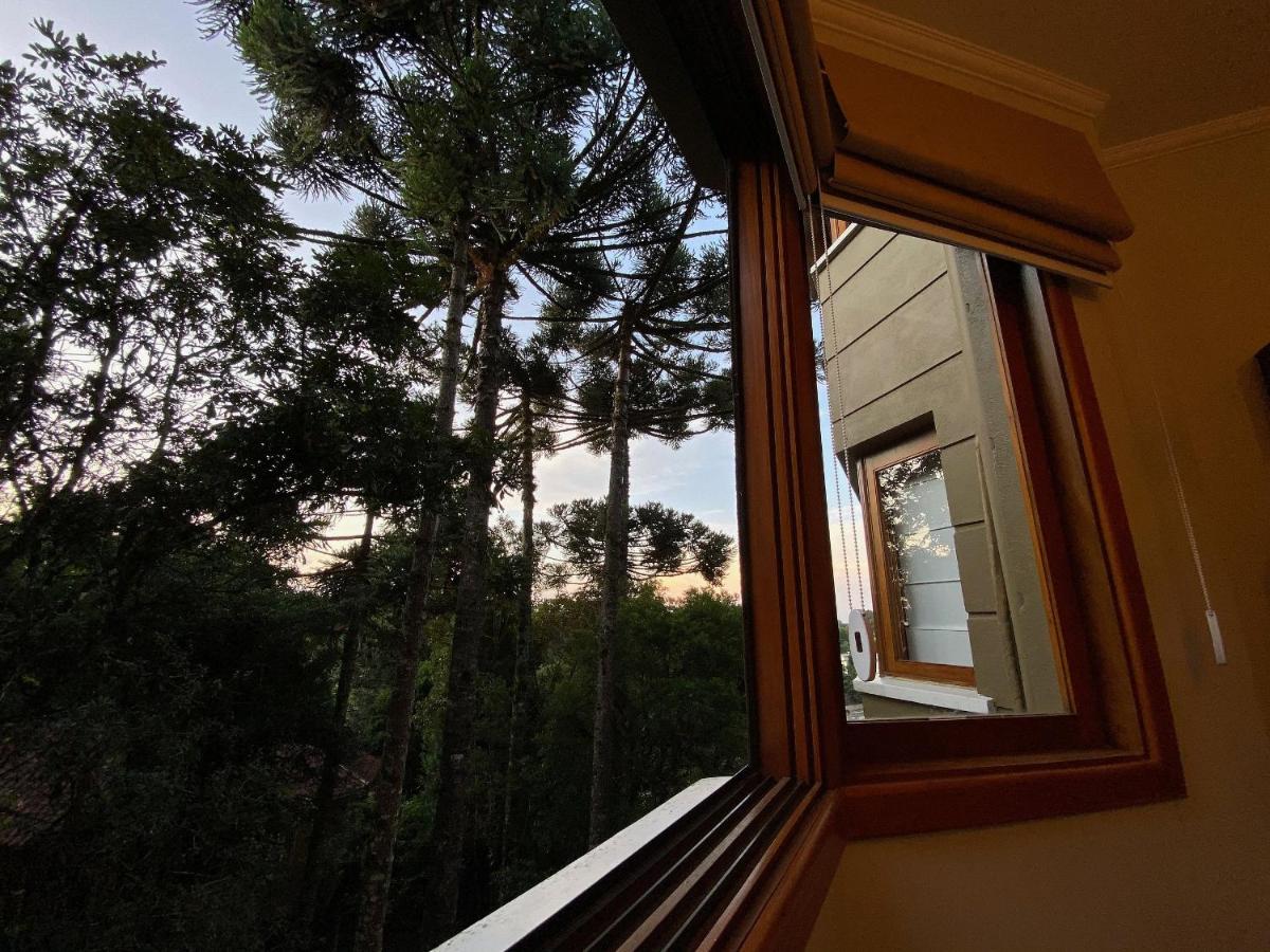 Lof Araucárias próx Rua Coberta by Achei Gramado - B&B Gramado