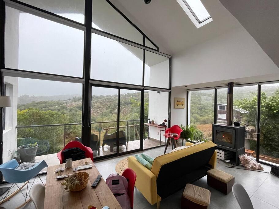 Diseño confort, tina a pasos de la cañada - B&B Villa Serrana