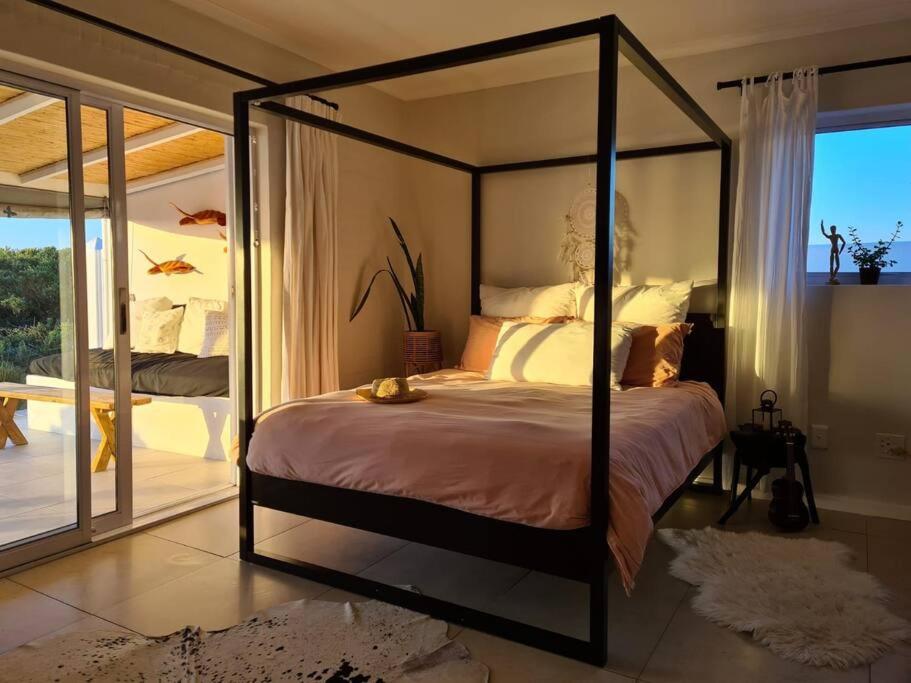 Sunbird House - Ferienwohnung Grottobaai
