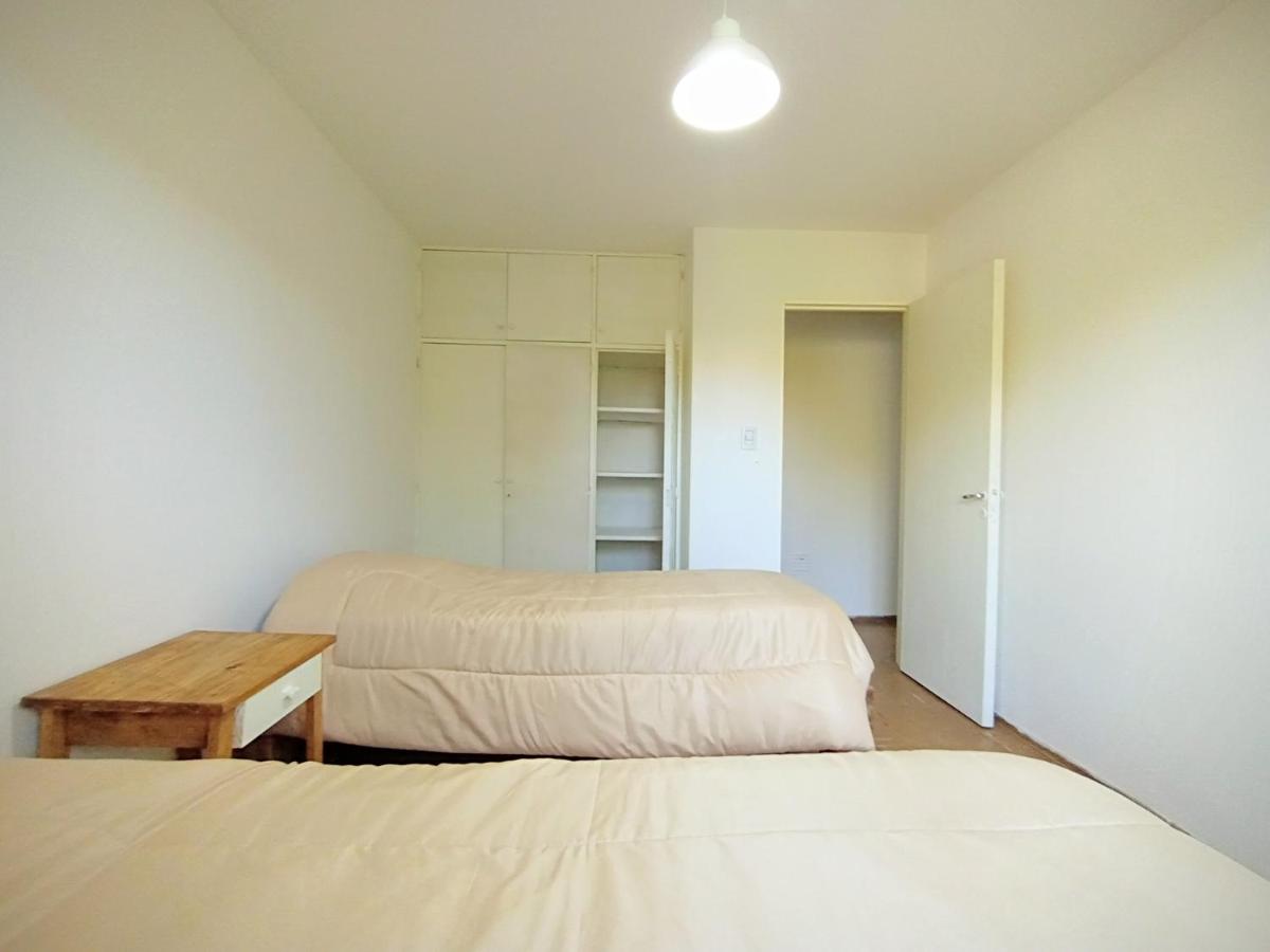 Cama individual en habitación compartida