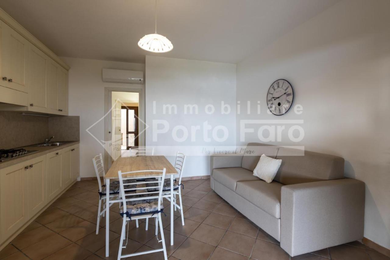 L325 - Bilocale con giardino e vista mare panoramica a Porto Mannu - B&B Palau