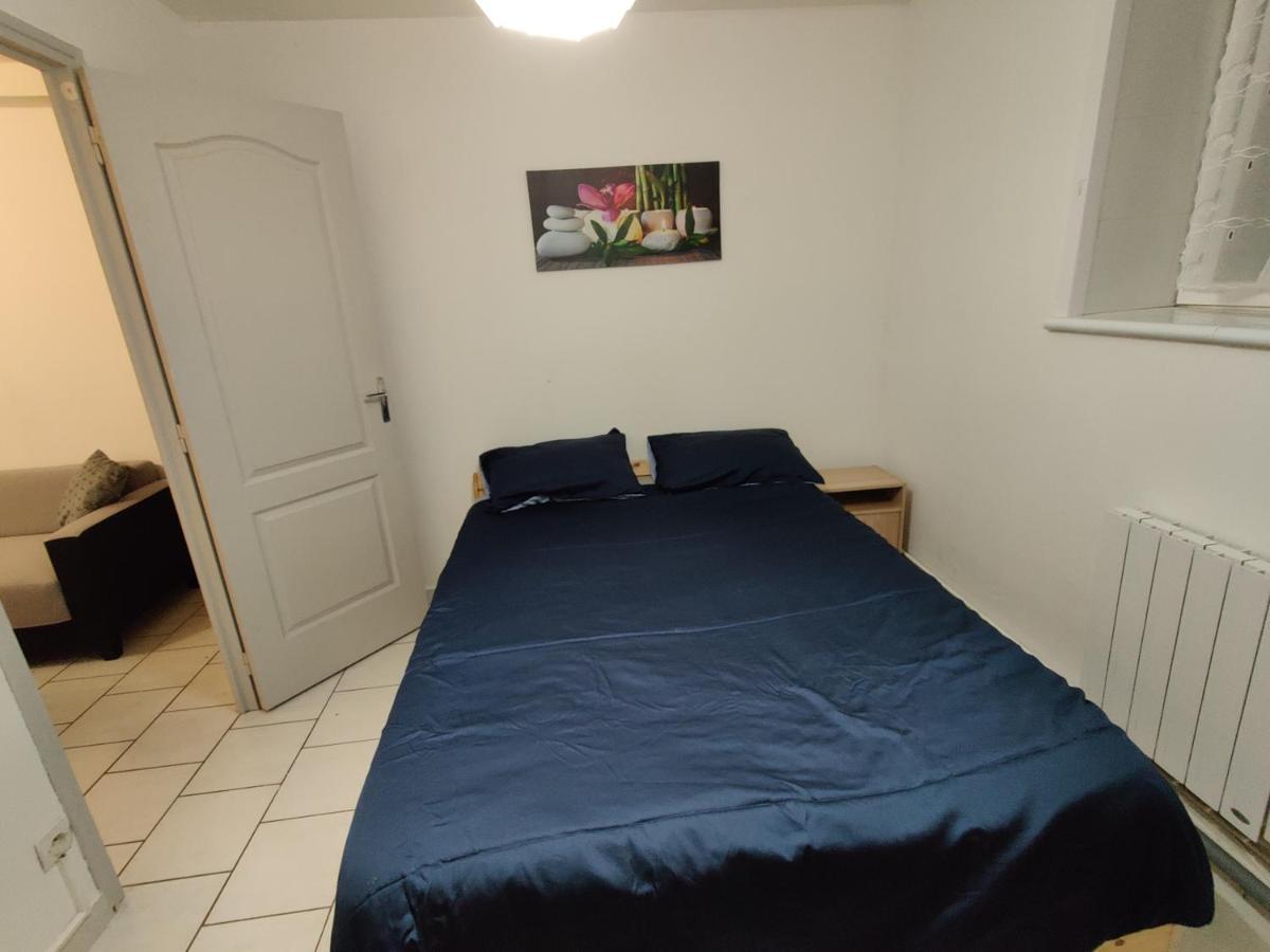 Appartement calme au centre ville proche tribunaux - Bed and Breakfast