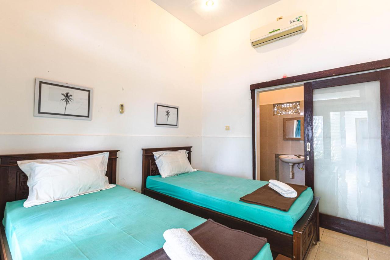 Camera Deluxe Doppia con Letti Singoli