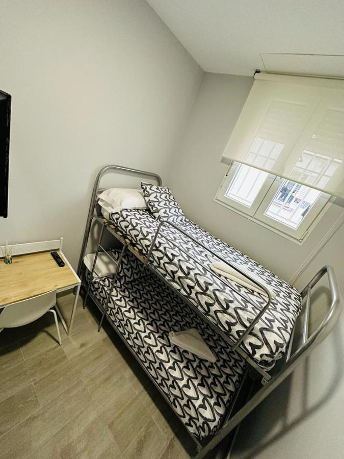 Camera con Letto a Castello e Bagno in Comune