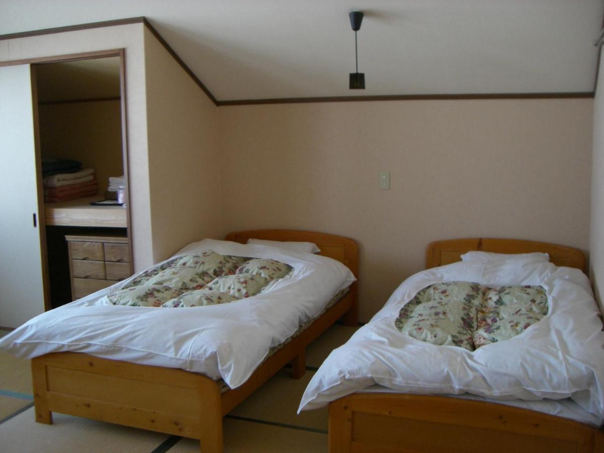 Camera Doppia con Letti Singoli con Area Tatami