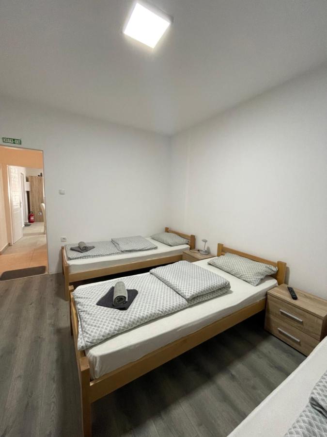 Tweepersoonskamer met 2 Aparte Bedden