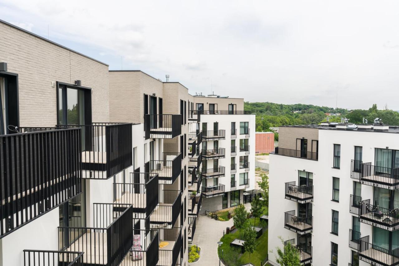 Esencja Apartments with Free Parking Garbary 104 by Noclegi Renters - Chambres d’hôtes