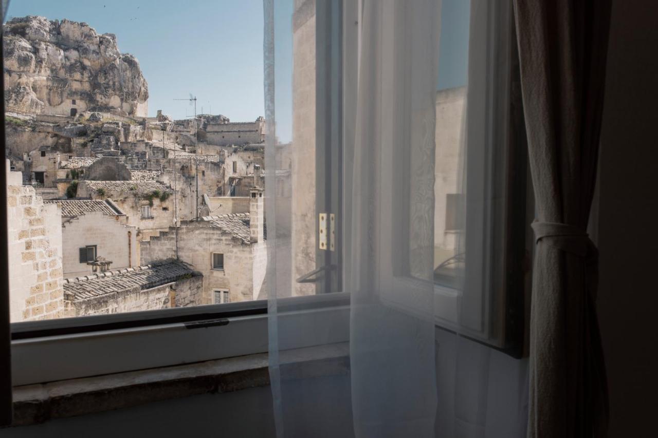 Il Vicinato, casa vacanza immersa nel cuore dei Sassi - Chambres d’hôtes Matera