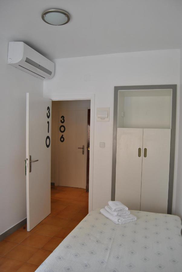 Camera Singola con Bagno in Comune