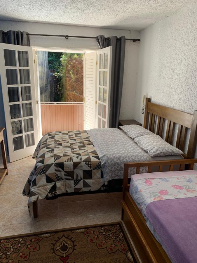 Kitnet, pertinho de tudo. - Chambres d’hôtes