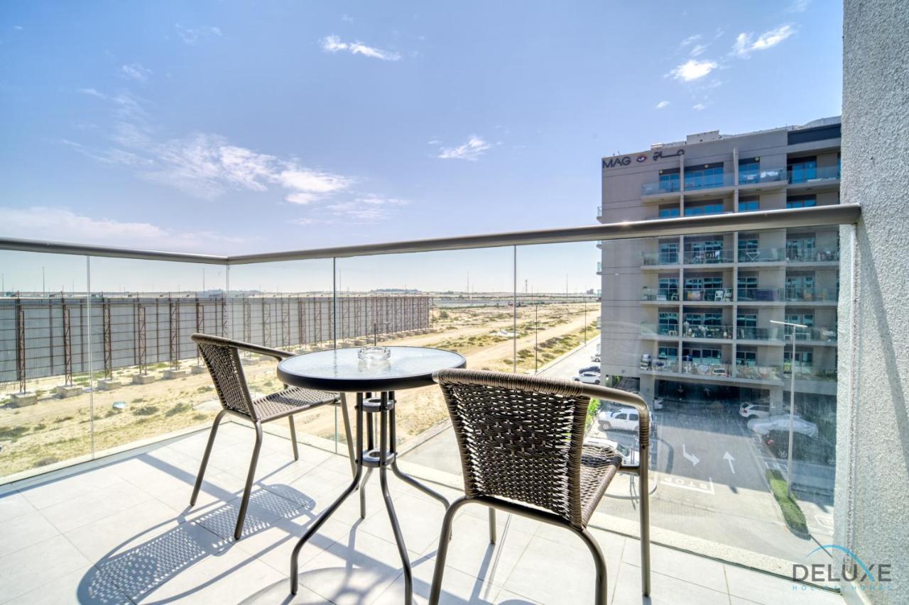 Classic 1BR at MAG 510 Dubai South by Deluxe Holiday Homes - Chambres d'hôtes Dubaï
