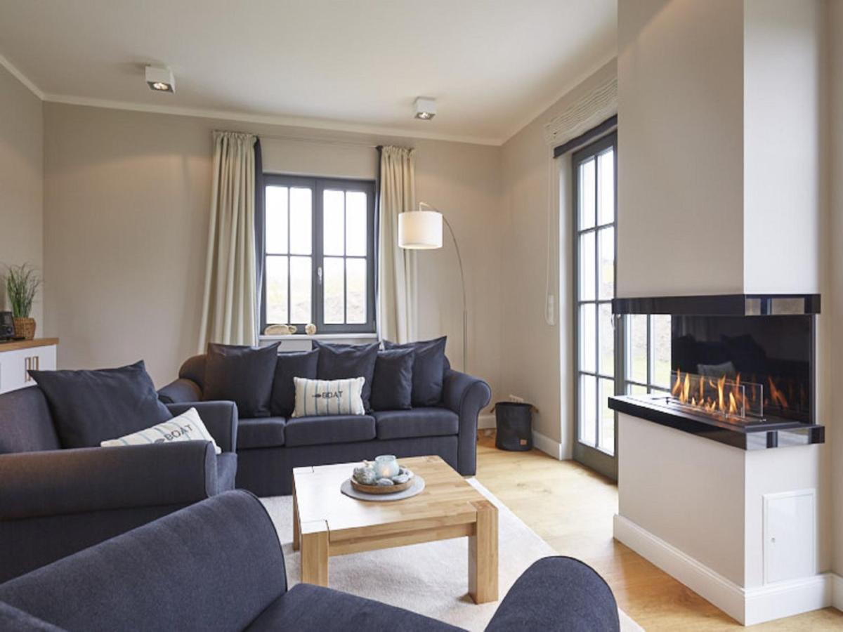 Reetland am Meer - Ihre Superior Reetdachvilla E28 - Zwei Schlafzimmer, Kamin & pure Wohlfühlatmosphäre - B&B Dranske