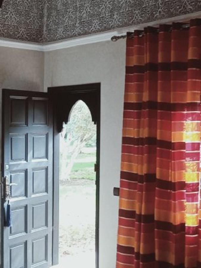 Camera Quadrupla con Vista Giardino 