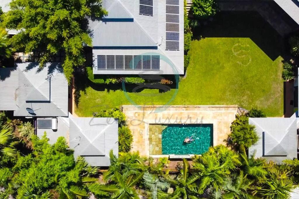 Zenhouse: 6-BR Balinese Tropical Oasis in Nightcliff Central - Chambres d’hôtes