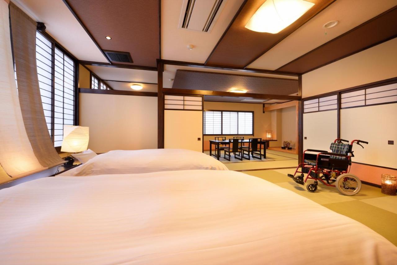 Chambre Sans Barrières avec Espace Tatami et Salle de Bains Commune