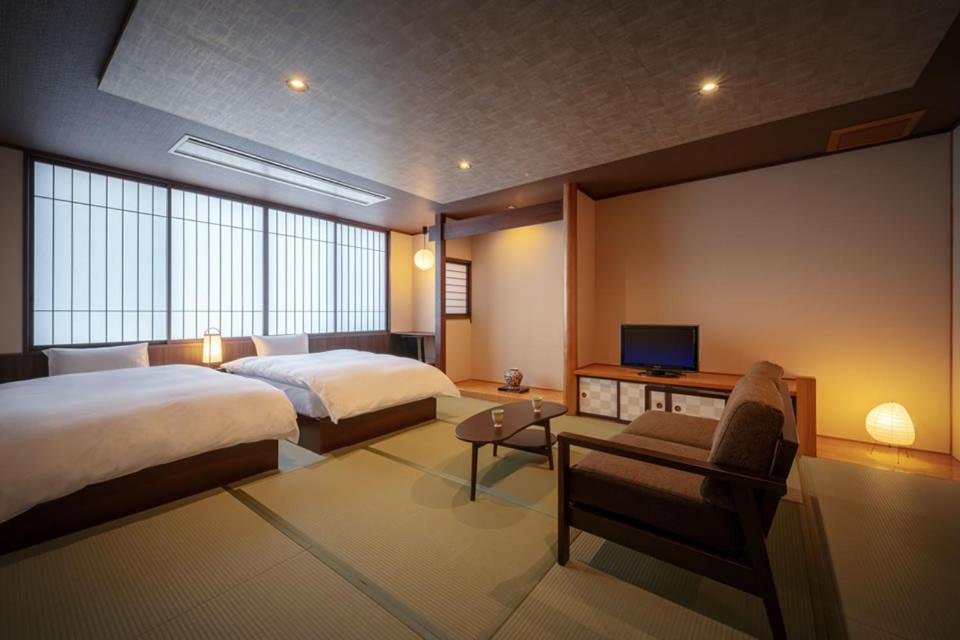 Zweibettzimmer mit Gemeinschaftsbad