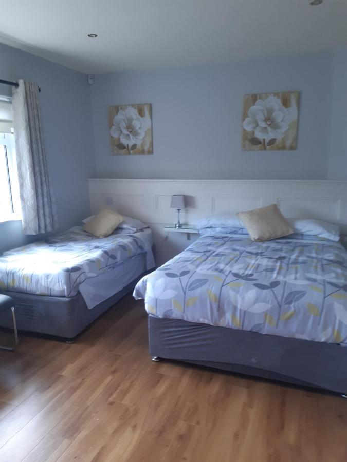 Habitación Triple con vistas al jardín