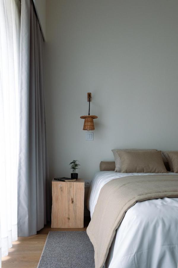 Kamer met Queensize Bed en Uitzicht op de Tuin