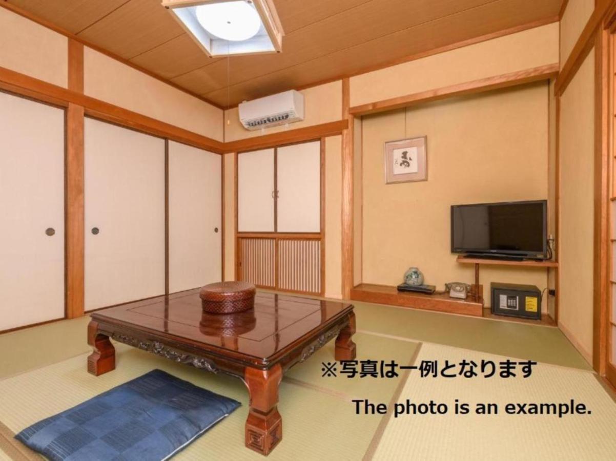 Quadruple Room with Shared Bathroom