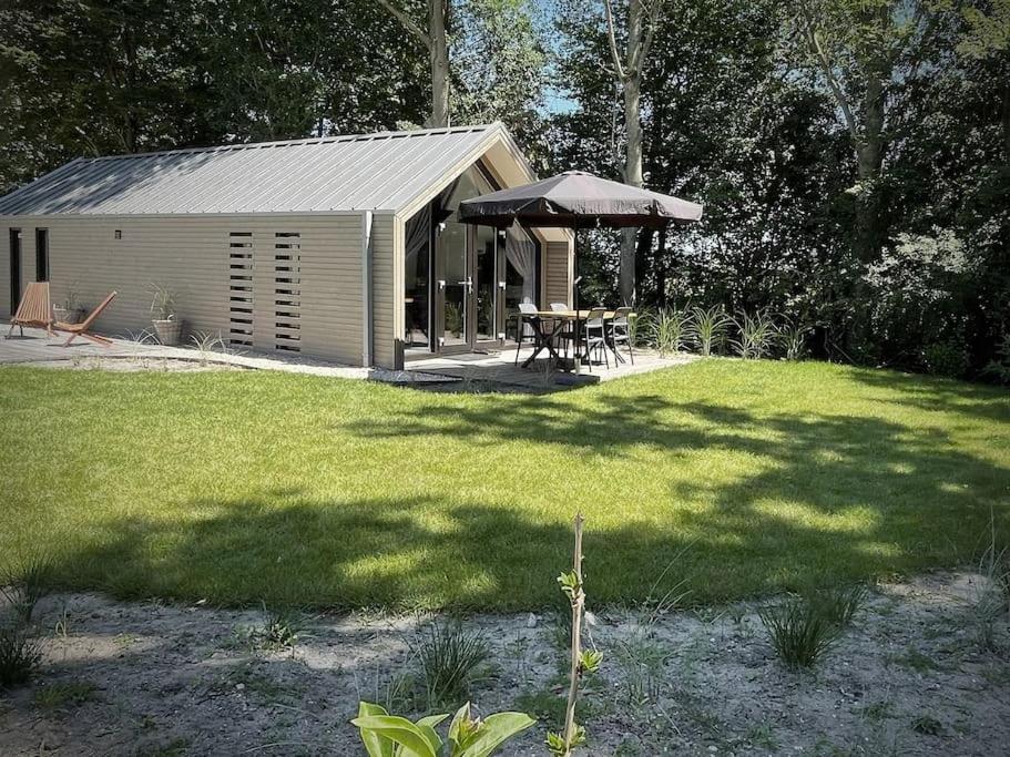 Beachhouse Veluwemeer mit großem Garten in Strandnähe (inkl. Hallenbadnutzung) - Bed and Breakfast Hulshorst