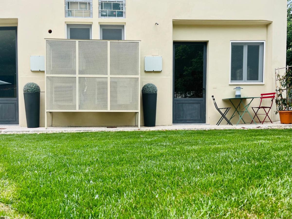 Appartamento 109 con giardino esclusivo - Chambres d’hôtes