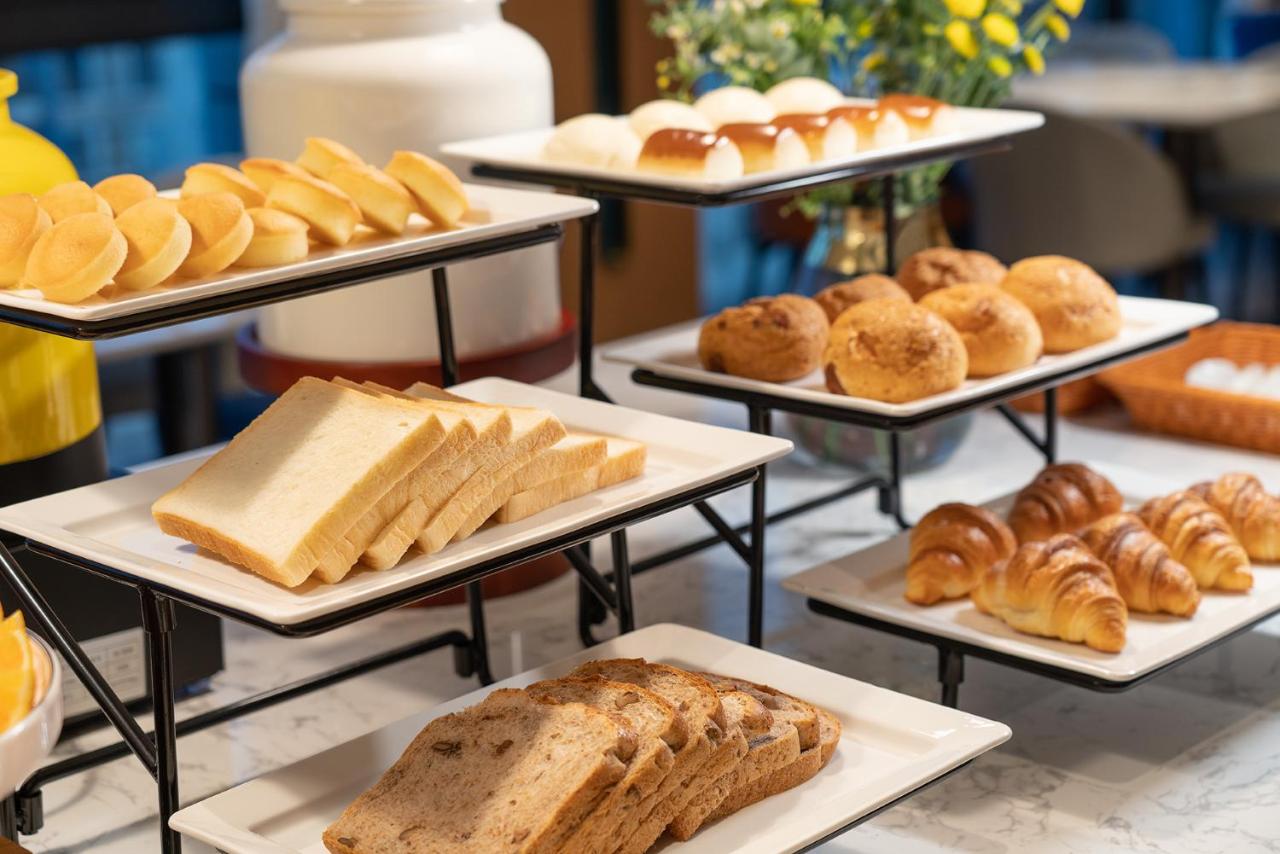Golden croissants sit at dog-friendly Holiday Inn Express Nanning Convention And Exhibit by IHG in Nanning.