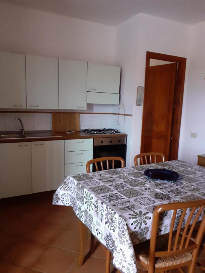 casa rosa nel residence mirice con piscina ,wifi,climatizzatore - vicino al mare - B&B Aglientu