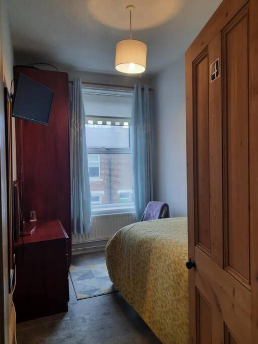 Single Room with Shared Shower and Toilet