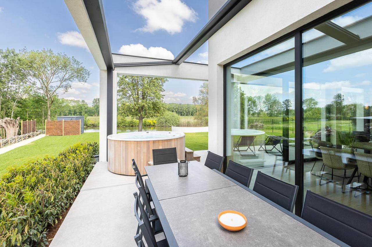 Leie Villa II - by the river with sauna & jacuzzi - B&B Deinze