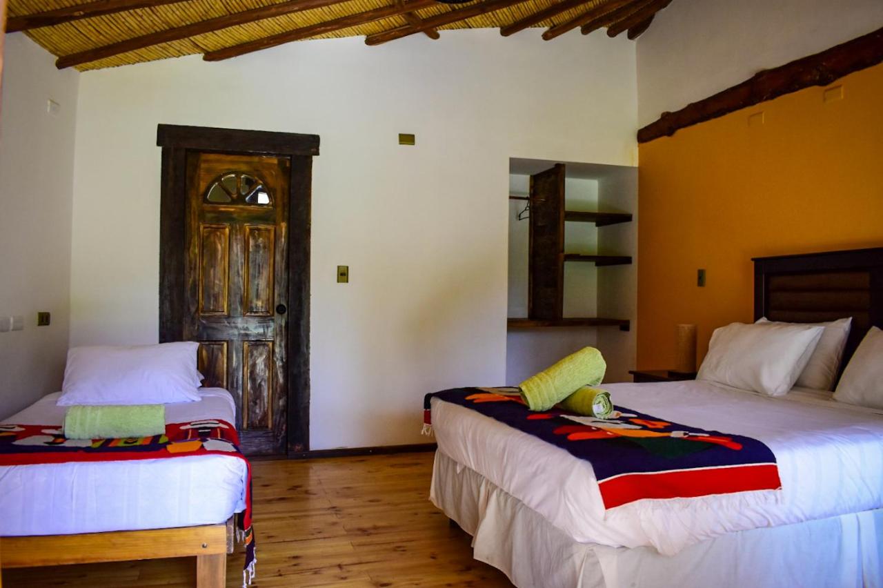 Camera Tripla con Vista Giardino