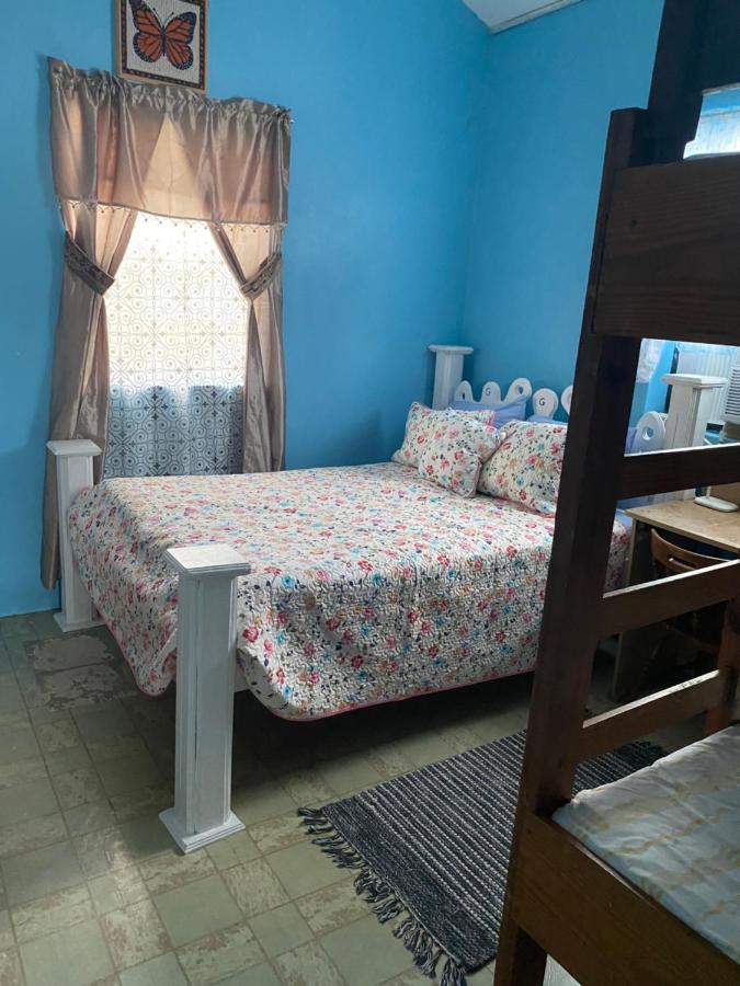 Camera Familiare con Bagno in Comune