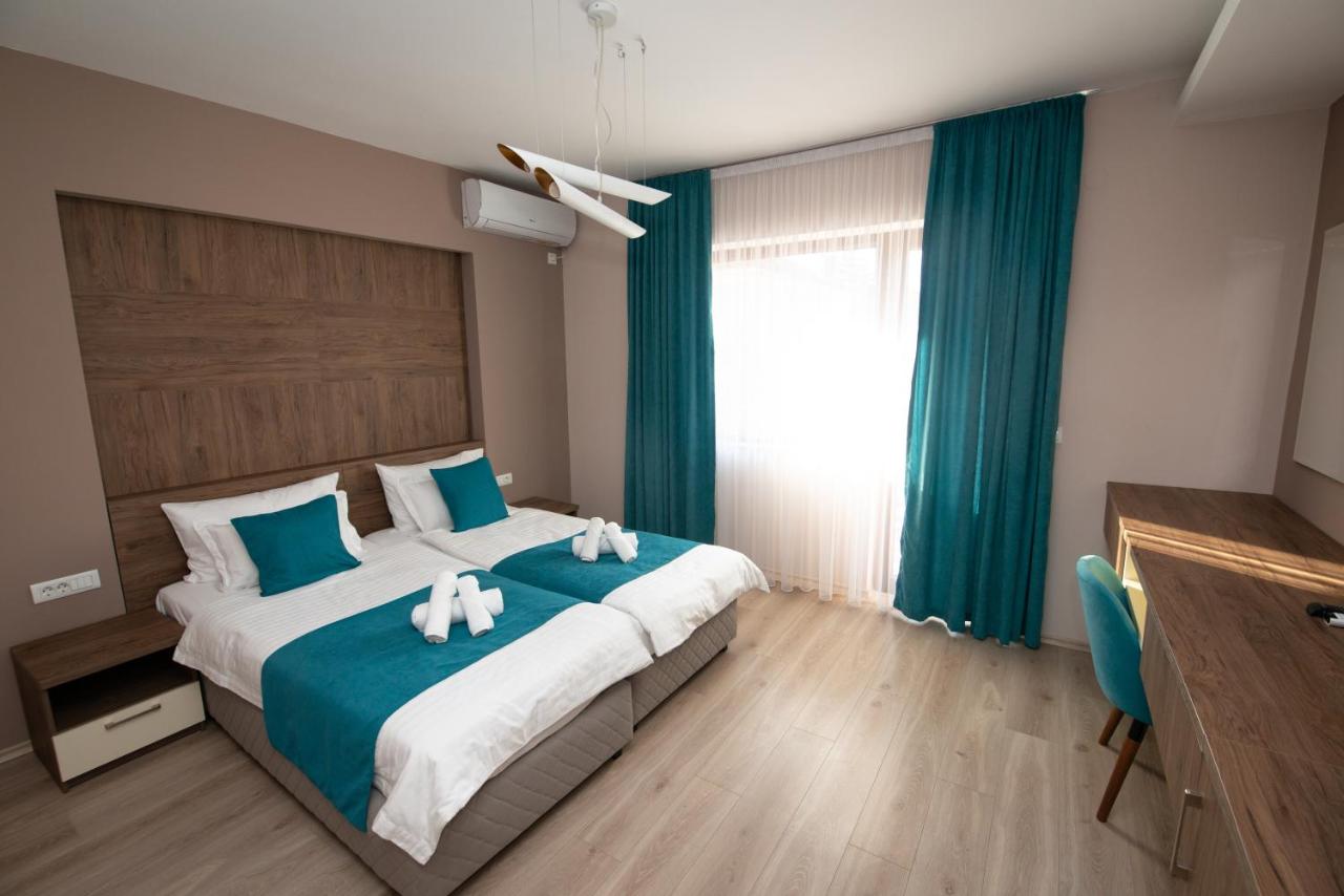 Luxe Kamer met 1 of 2 Bedden en Balkon