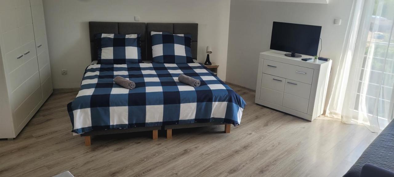 Monolocale con Divano-Letto
