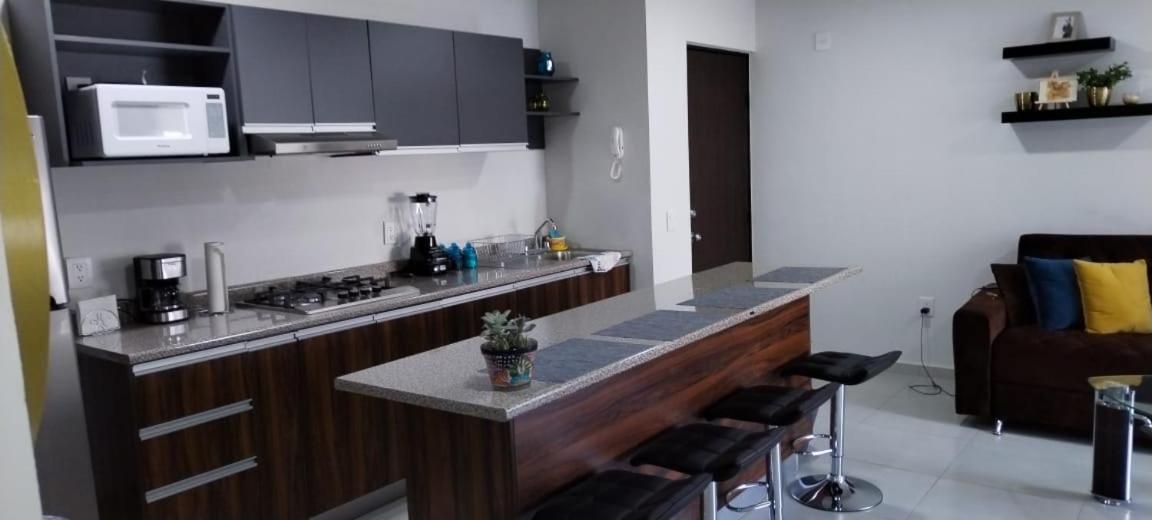 Hermoso y Comfortable Departamento 15 min del Aeropuerto - Bed and Breakfast