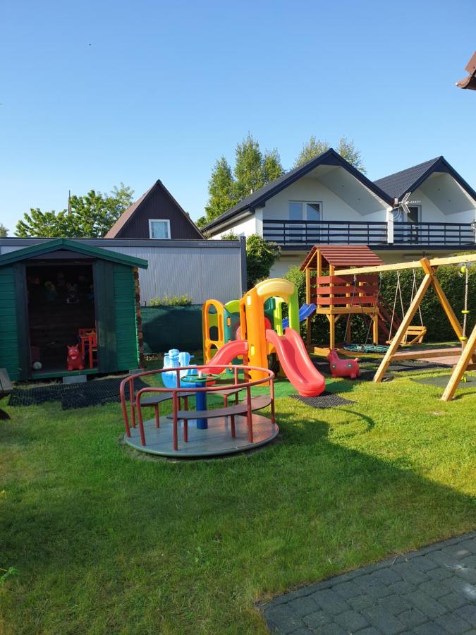 Apartamentowe domki drewniane Colorado - B&B Karwia