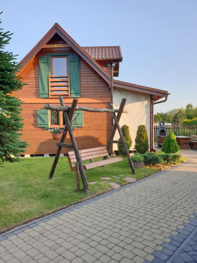 Apartamentowe domki drewniane COLORADO - Chambres d’hôtes Karwia