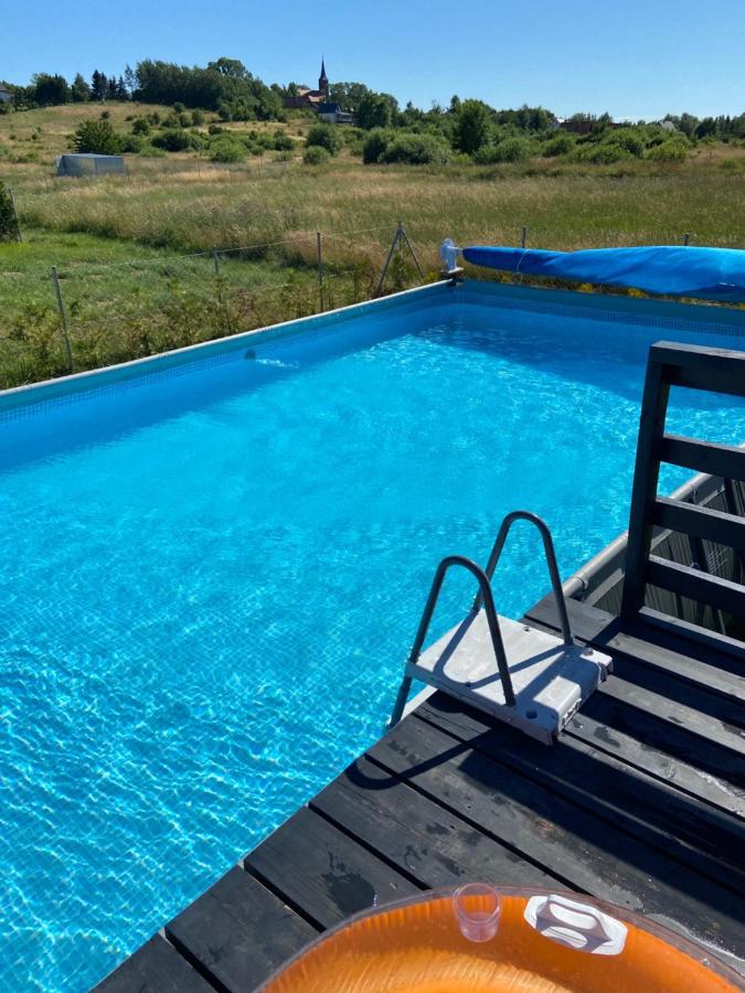 BIAŁE DOMKI - Ferienwohnung Rusinowo