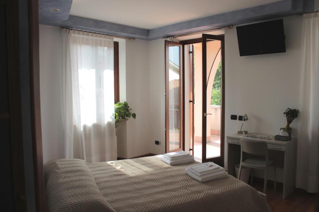 Camera Matrimoniale/Doppia con Letti Singoli con Letto Supplementare