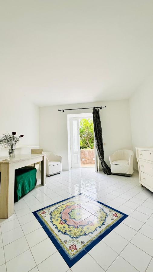 Camera Familiare con Vista Giardino