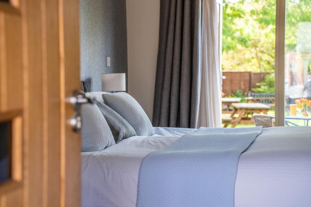 Chambre Double ou Lits Jumeaux Deluxe – Vue sur Jardin