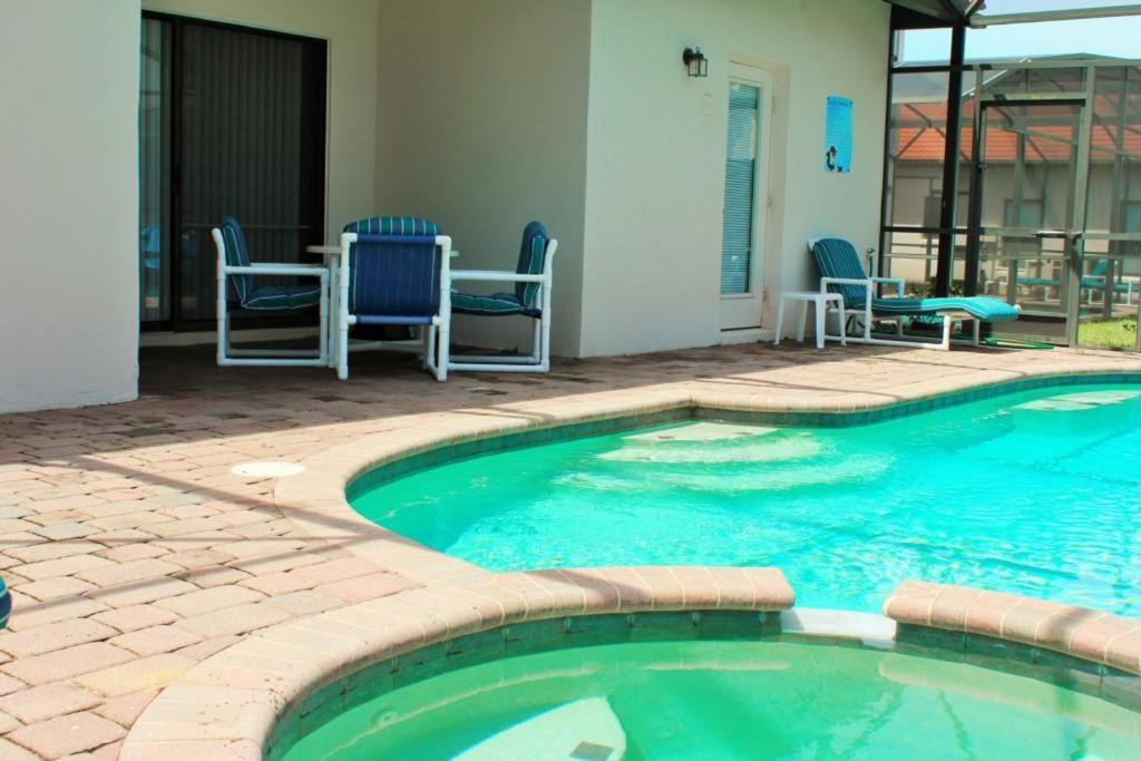 B&B Orlando - 4 bedrooms pool home Gated resort of High Grove - Bed and Breakfast Orlando