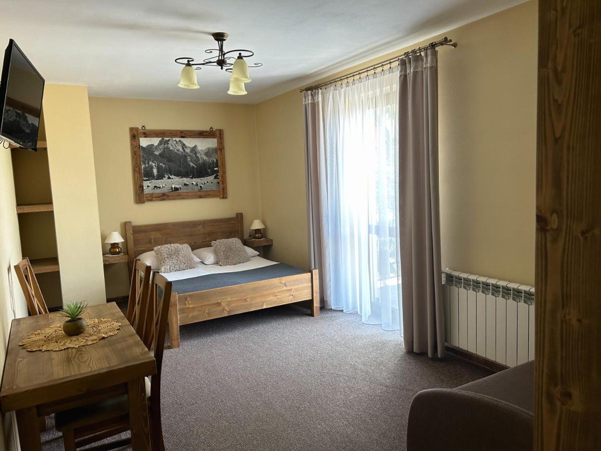 Dreibettzimmer mit Balkon